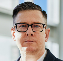 Alexander Hughes, generální ředitel a vedoucí pracovník společnosti zaměřené na obchodování s kryptoměnami, portrét